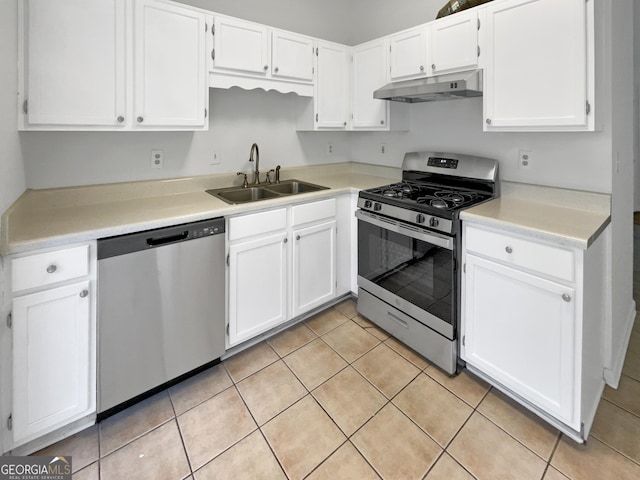 kitchen with white cabinets, sink, and stainless steel appliances