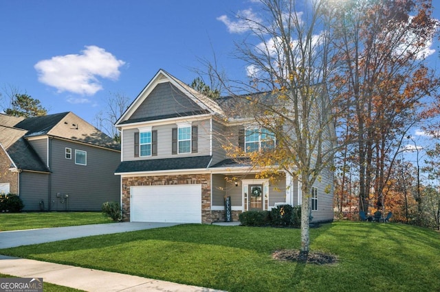 view of front of home featuring a garage and a front lawn