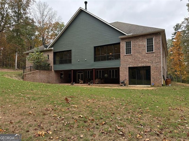 25 Fireside Ct NW, Cartersville, GA 30120 - back of house featuring a lawn and brick siding