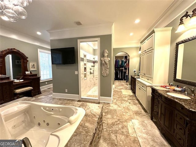 bathroom featuring vanity, separate shower and tub, and crown molding