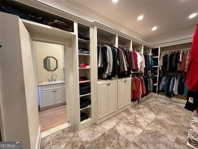 walk in closet with sink