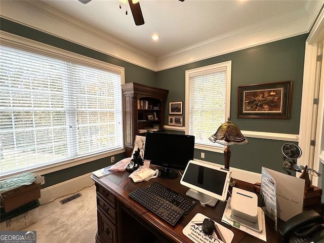 carpeted office space with crown molding