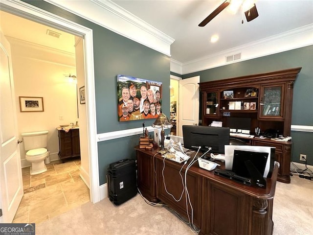 office space featuring light carpet, ceiling fan, and crown molding