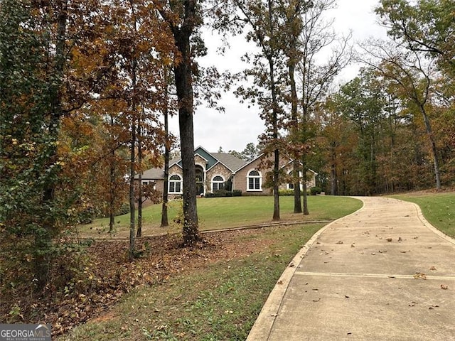 view of front of property with a front lawn