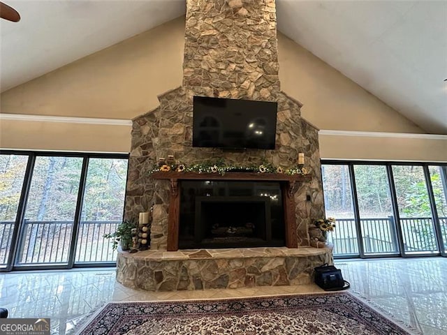 25 Fireside Ct NW, Cartersville, GA 30120 - tiled living room with high vaulted ceiling and a stone fireplace