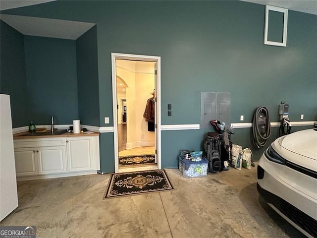 bathroom with concrete flooring and sink