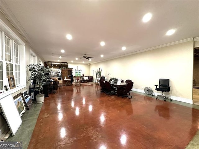 interior space with ceiling fan and ornamental molding