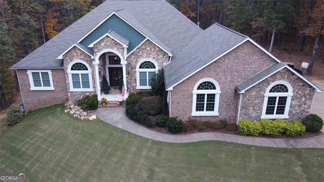 25 Fireside Ct NW, Cartersville, GA 30120 - view of front of property featuring stone siding and a front lawn
