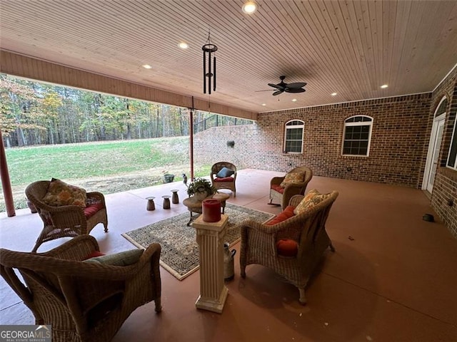 view of patio with ceiling fan and an outdoor hangout area