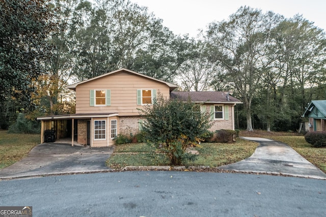 view of front of home featuring a carport