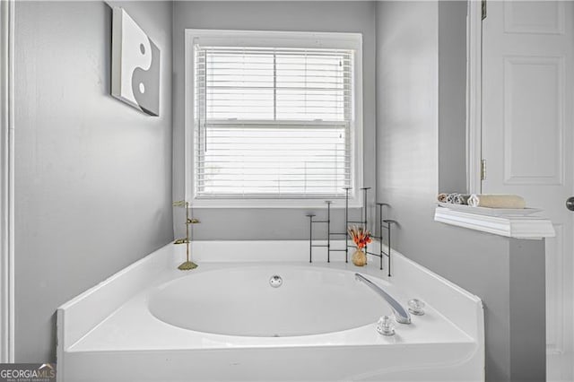 bathroom featuring a bathing tub