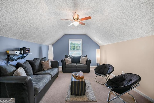 living room with a textured ceiling, carpet floors, ceiling fan, and lofted ceiling