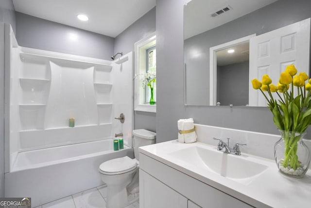 full bathroom with vanity, tub / shower combination, and toilet