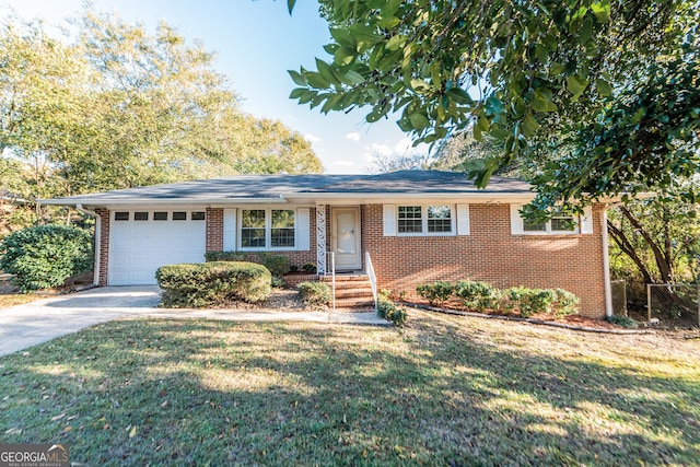 ranch-style house with a garage and a front yard