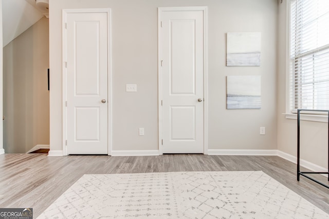 unfurnished bedroom with light hardwood / wood-style flooring