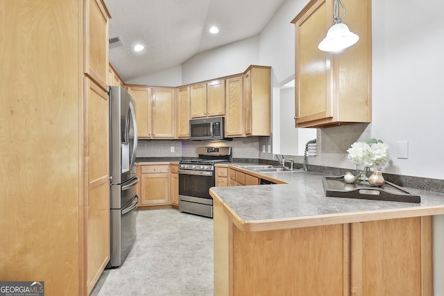 kitchen featuring pendant lighting, light brown cabinets, sink, appliances with stainless steel finishes, and kitchen peninsula