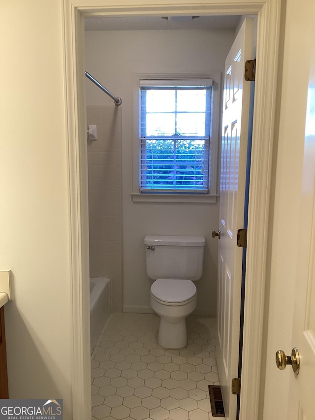 full bathroom with tile patterned floors, toilet, vanity, and bathing tub / shower combination