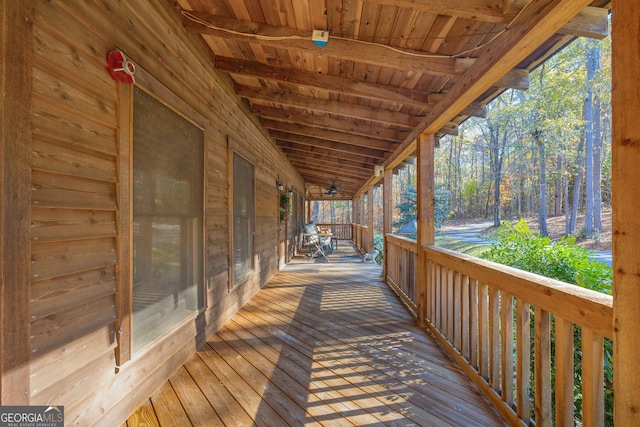 wooden deck featuring covered porch