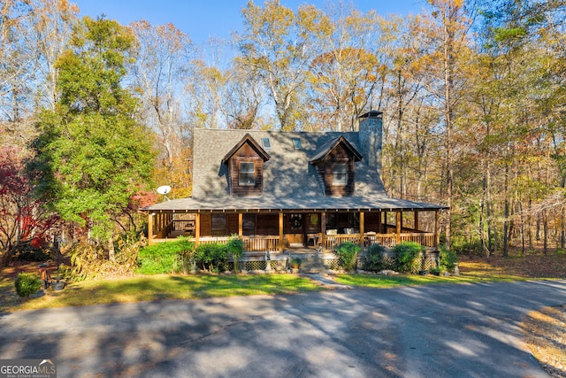 view of front of property featuring covered porch