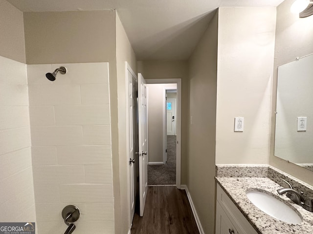 bathroom featuring hardwood / wood-style floors and vanity