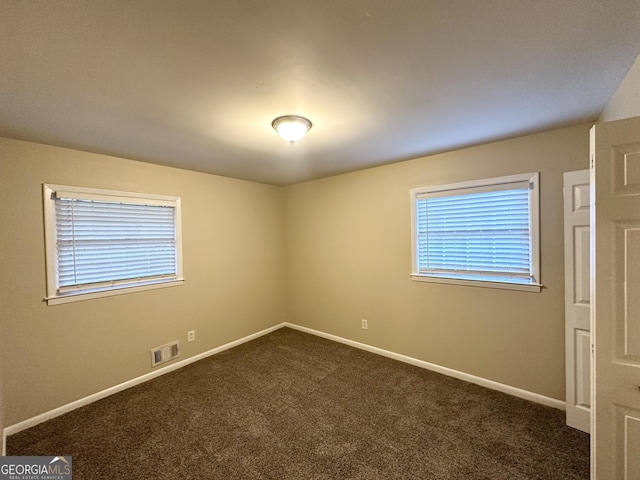 view of carpeted spare room