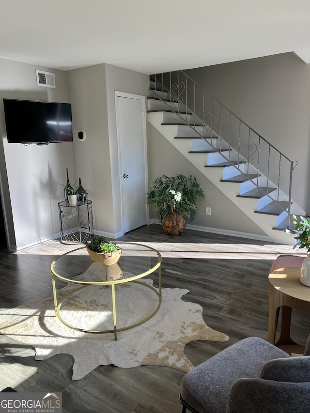 living room with wood-type flooring