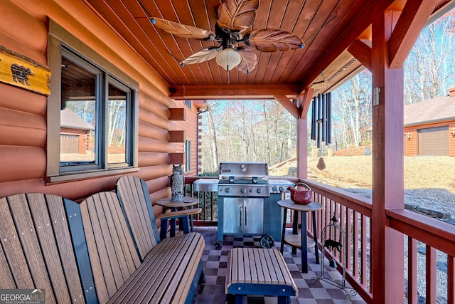 view of patio / terrace featuring ceiling fan and a grill