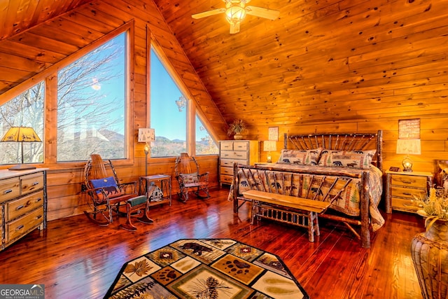 bedroom with hardwood / wood-style flooring, wood ceiling, and vaulted ceiling