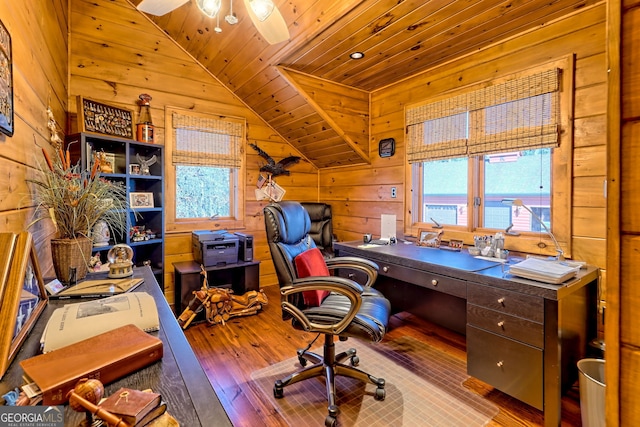 office area with ceiling fan, wooden walls, light hardwood / wood-style flooring, wooden ceiling, and lofted ceiling