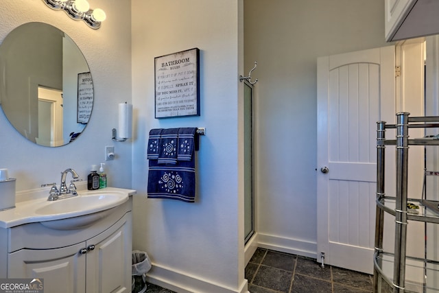 bathroom with a shower and vanity