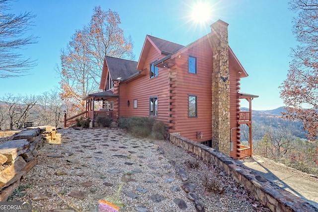 view of side of property featuring a mountain view