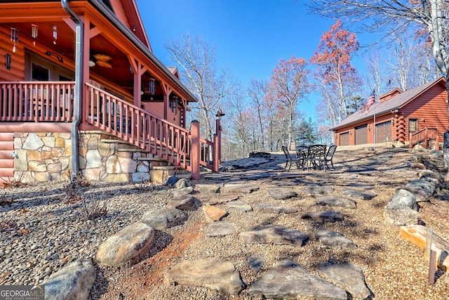 view of side of property with a garage