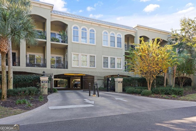 150 Salt Air Dr Unit 310, Saint Simons, GA 31522 - view of property featuring driveway
