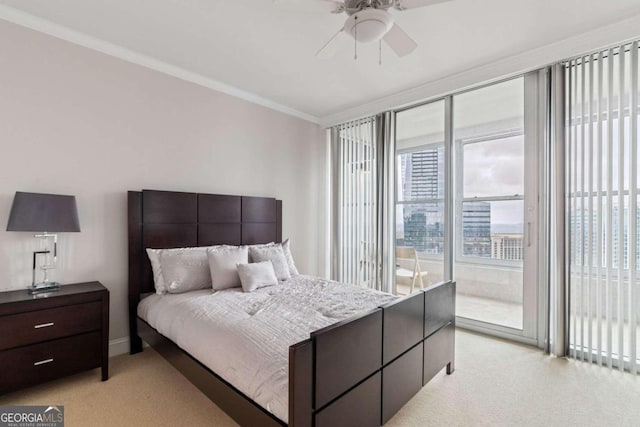 bedroom with light carpet, access to outside, ceiling fan, and crown molding