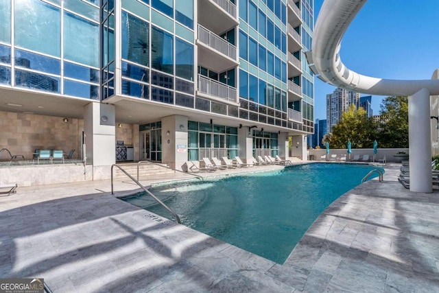 view of pool with a patio area