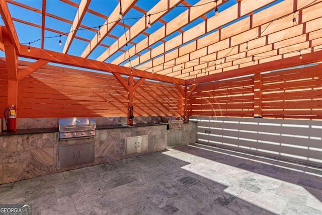 view of patio featuring a pergola and area for grilling