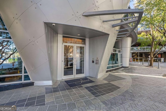 view of exterior entry featuring french doors