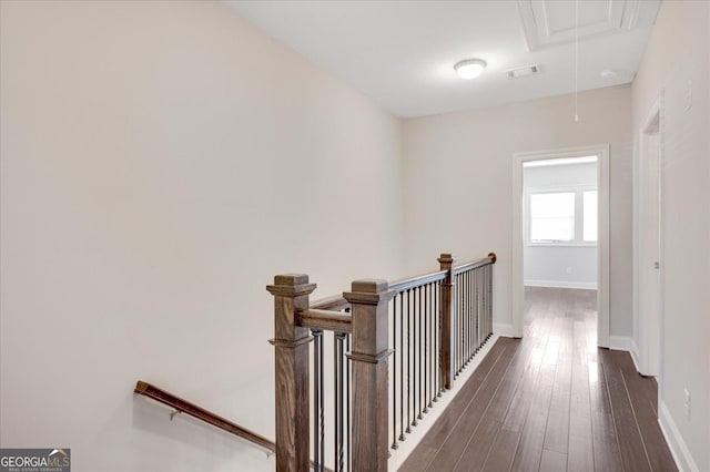 corridor featuring dark wood-type flooring