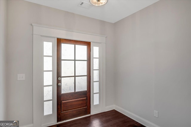 entrance foyer with dark hardwood / wood-style flooring