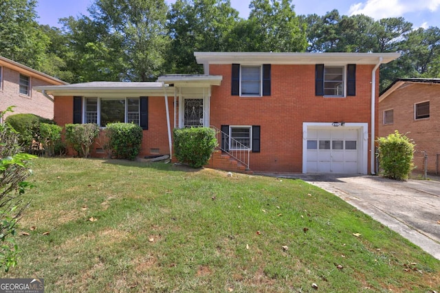 split level home featuring a garage and a front lawn