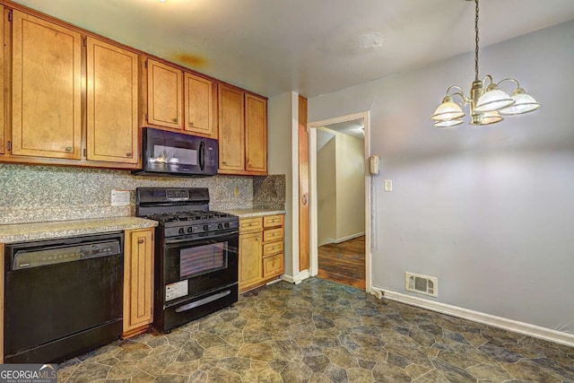 kitchen with a chandelier, decorative backsplash, hanging light fixtures, and black appliances