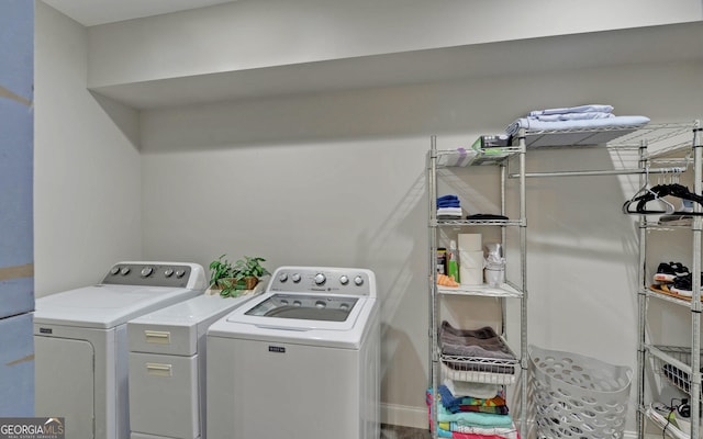 laundry area with washer and clothes dryer