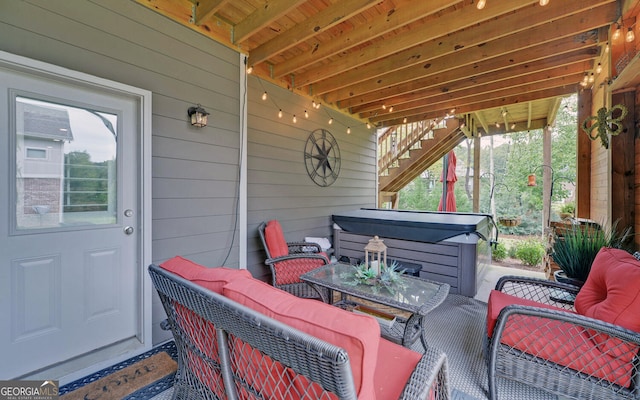 view of patio / terrace featuring a hot tub