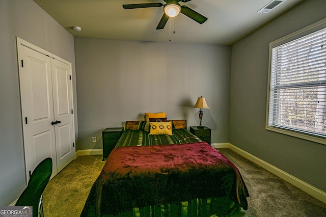 bedroom featuring carpet, a closet, and ceiling fan