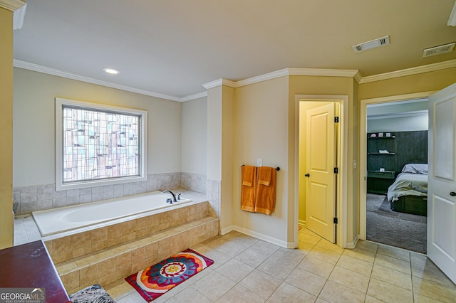 bathroom featuring tile patterned flooring, tiled bath, and ornamental molding