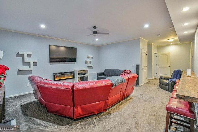 carpeted living room featuring ceiling fan and crown molding