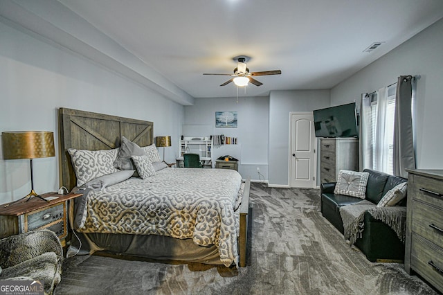 carpeted bedroom with ceiling fan