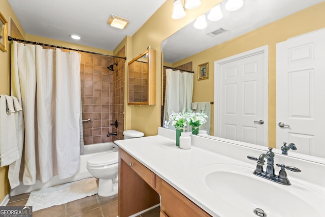 full bathroom featuring vanity, tile patterned flooring, shower / bathtub combination with curtain, and toilet