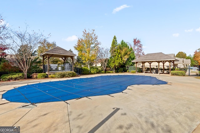 view of pool featuring a gazebo and a patio