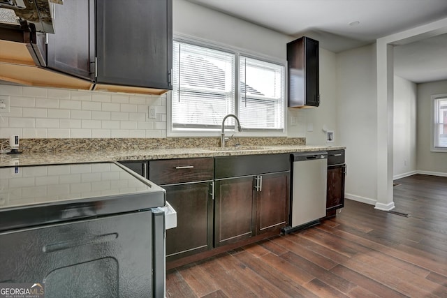 kitchen with sink, stainless steel dishwasher, dark hardwood / wood-style floors, tasteful backsplash, and dark brown cabinetry